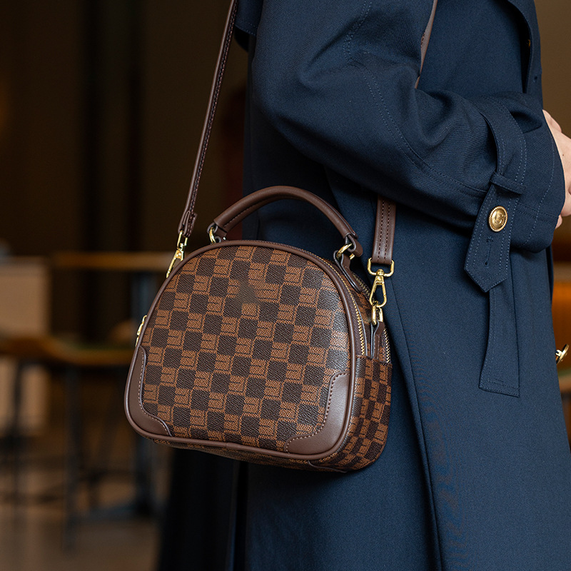 **Brown and black plaid shoulder bag**