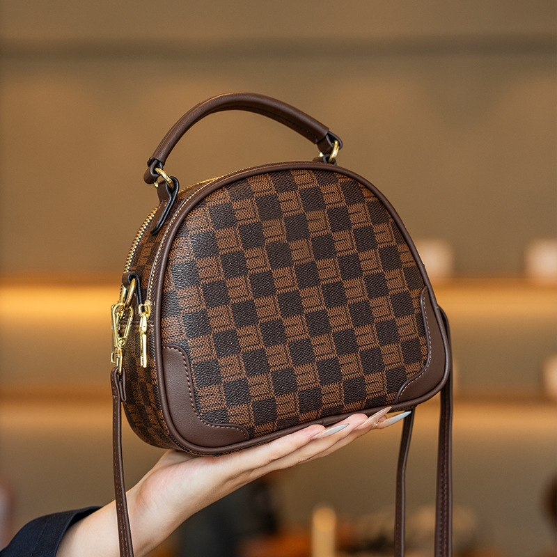 **Brown and black plaid shoulder bag**